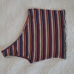 M One strap crop top. Ribbed texture, stripes and wrapped seam on bottom